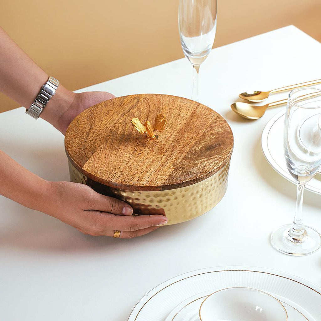 Round metal box with wooden lid