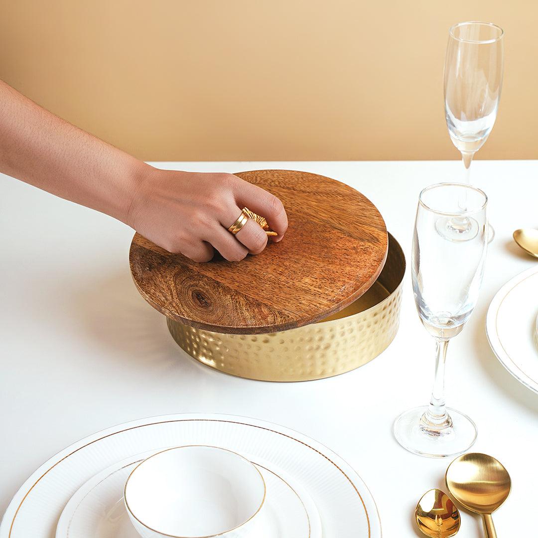 Round metal box with wooden lid